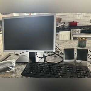 1) Dell LCD Flat Panel Monitor, 1) Acer Keyboard, & 1) Diamond Speakers